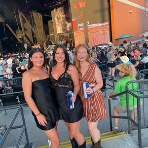 Orange and tan stripped dress with side cutouts